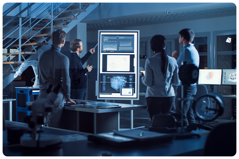 engineers going over a schematic